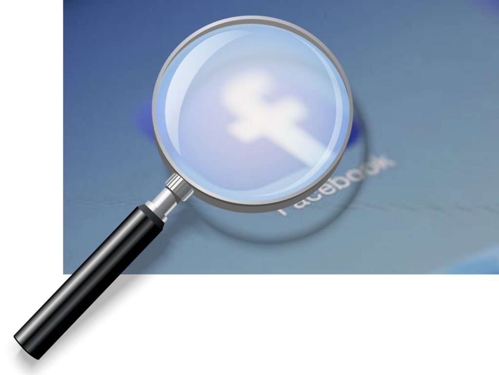 IMAGE: Facebook under magnifying glass 