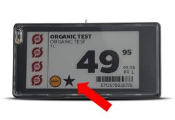 IMAGE: An electronic label in a supermarket displaying a black star to mark the product as European, and a red arrow showing it