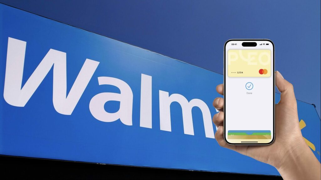 IMAGE: A hand using Apple Pay on top of the Walmart logo.